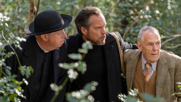 Mark Williams, John Light, and Ian Gelder in "Father Brown." © BBC. All Rights Reserved. 