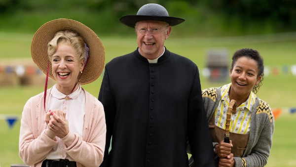 Claudie Blakely, Mark Williams, and Ruby-May Martinwood in "Father Brown." © BBC. All Rights Reserved. 